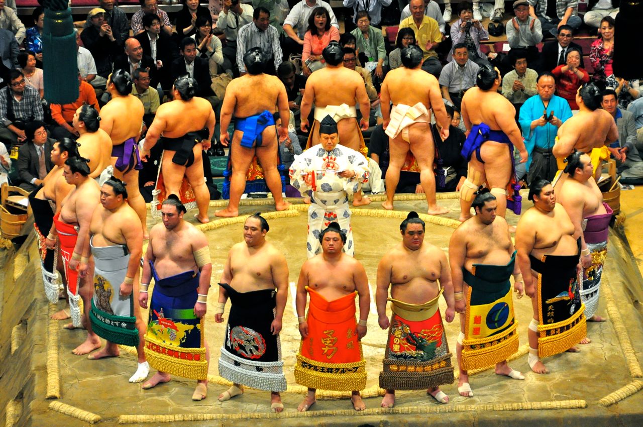 'The Rikishi during the "Dohyo-iri" ceremony.' 'The Rikishi during the "Dohyo-iri" ceremony.'